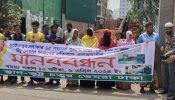 ডেমরায় জনসাধারণের চলাচলের রাস্তা বন্ধ করার প্রতিবাদে মানববন্ধন।